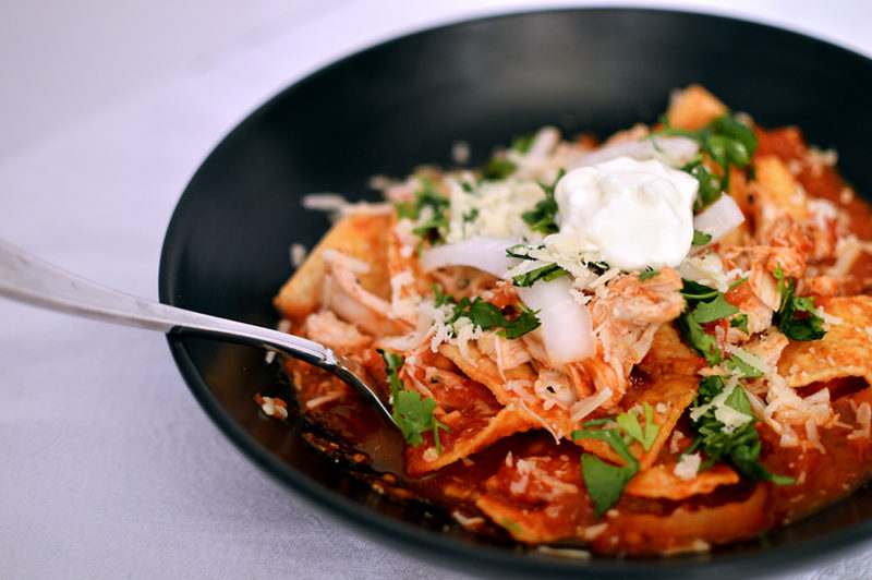 “Literally one of my favorite reciped I've blogged: Chipotle Chicken Chilaquiles. Crispy corn chips simmered with a chipotle salsa. Then topped with shredded chicken, sour cream, red onions, and cilantro. Recipe from ThatSquarePlate.com