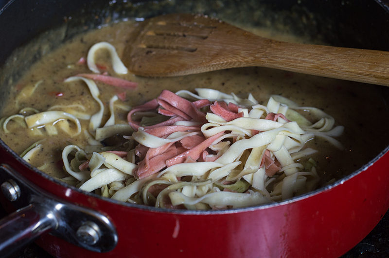 When you can't decide on which meat to cook with, why not add all three!? Shrimp, crab, and bacon with a wine sauce over pasta is never a bad thing.