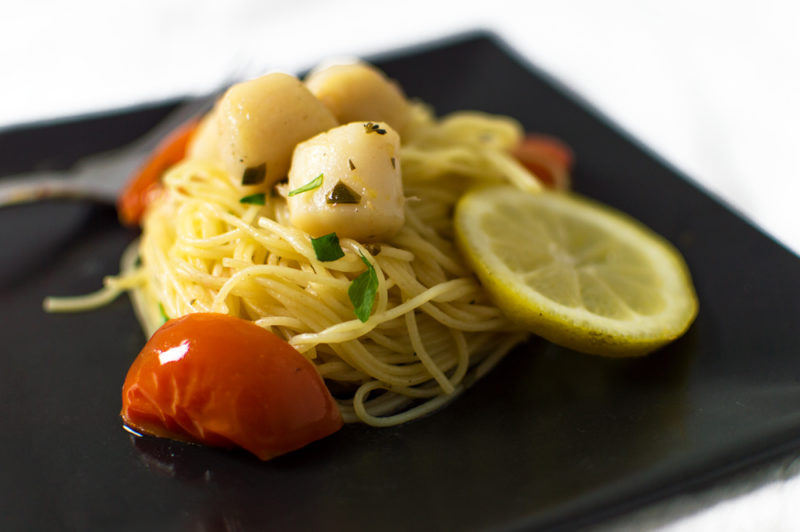 I was going for a scampi flavored seafood pasta, but I used fresh gulf scallops and added tomatoes, and this beautiful, tasty masterpiece was created!